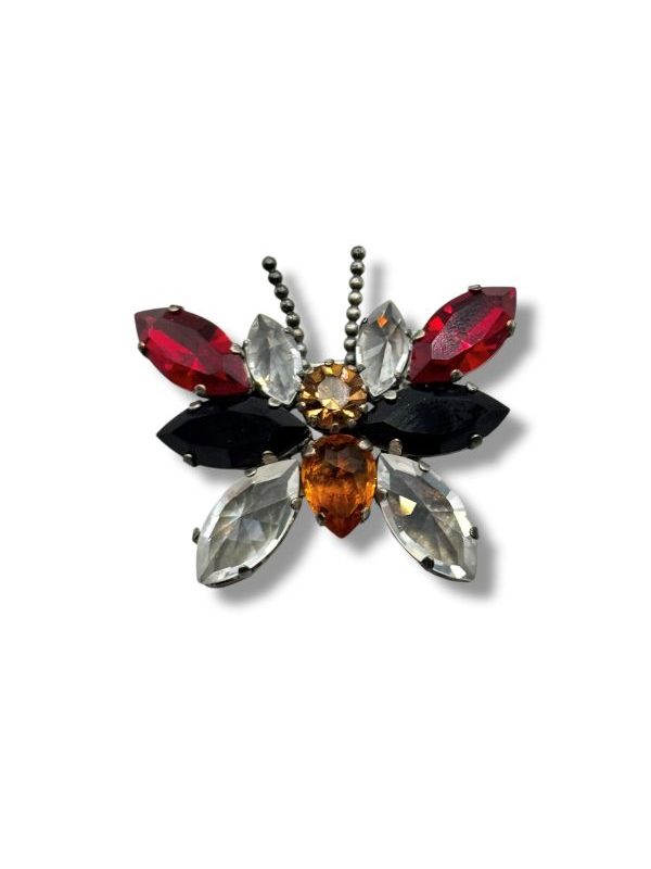 Spilla a farfalla artigianale con cristalli multicolore e metallo brunito. Made in Italy, pezzo unico ideale per cappotti e giacche. Eleganza e personalità. By Ave Caprice.